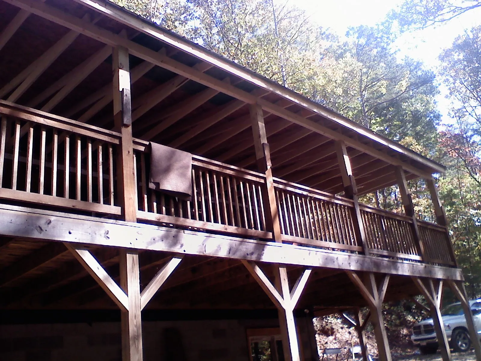Timber framing under a new elevated porch and deck — Roof Leak Repair in Prineville by Roofing Brothers
